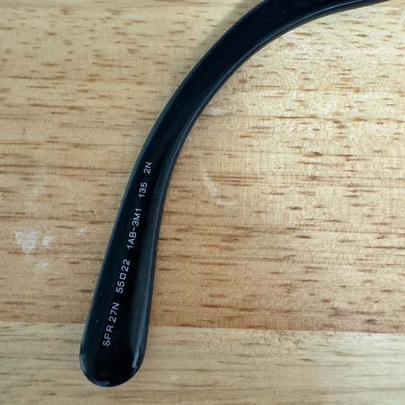 Black round Prada sunglassess with ornate arms. - Picture 4 of 5